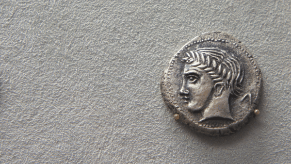 Ancient coin with a profile portrait.